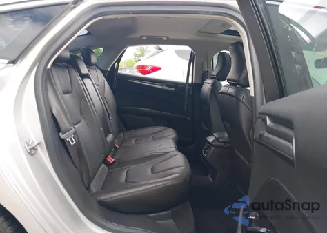 2015 Ford Fusion Titanium z USA, uszkodzony, nr VIN 3FA6P0K90FR277148